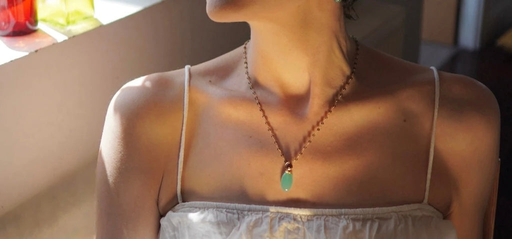 Woman wearing gemstone necklaces