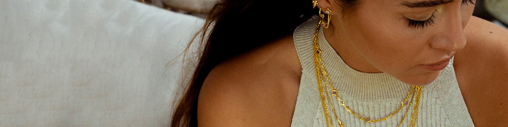 Woman wearing gold vermeil layering necklaces buy Azuni