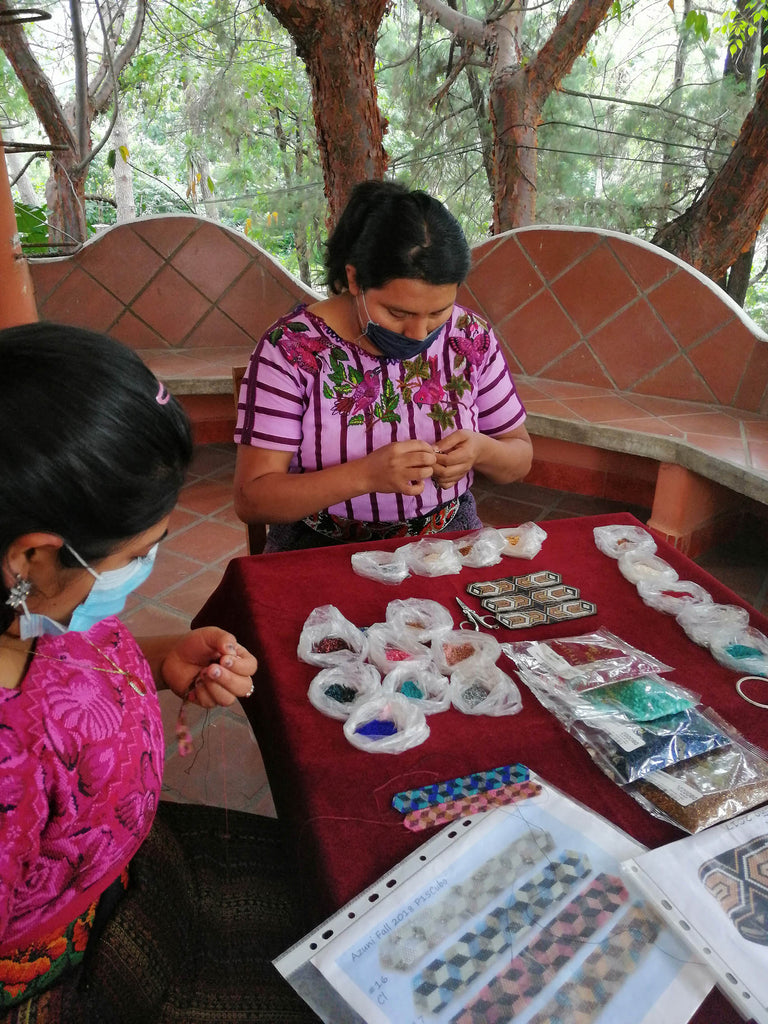 Mayan Indian women beading Azuni designs